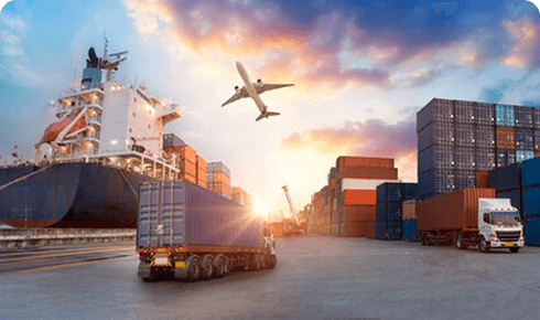 A ship, an aircraft and a truck at a busy freight terminal.
